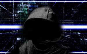 person dressed in a hood like a hacker